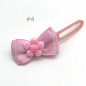 Preview: Hunde Schleifenspange mit Applikation 4,5 cm - rosa